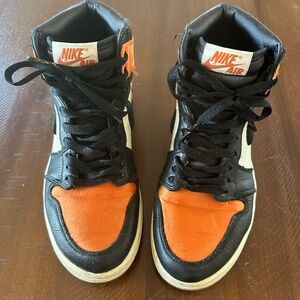 Nike High-Top Sneakers in Black and Orange
